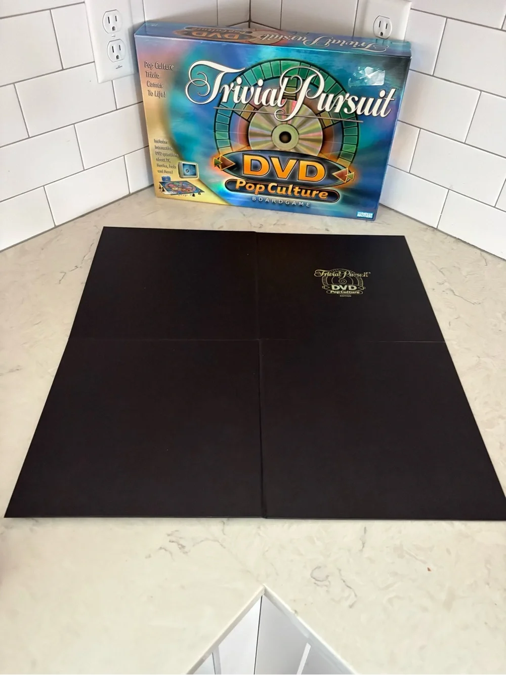 Trivia Pursuit DVD Pop Culture Board Game by Parker Brothers.